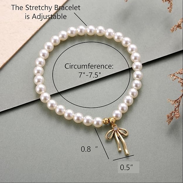 Pulsera de perlas delicadas con amuleto de lazo dorado